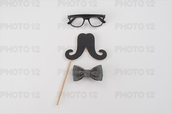 Glasses with paper mustache bow tie