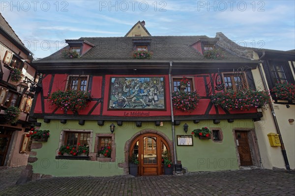 Colourful half-timbered houses in the historic old town of Riquewihr