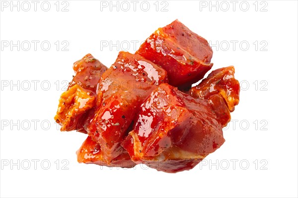 Raw piece of meat with spice and sauce prepered for barbecue. Gastronomy template isolated on white background