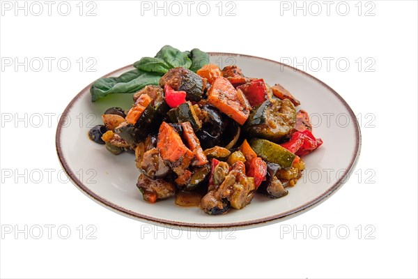 Plate with vegetable stew isolated on white background