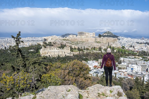 Tourist standing on rock