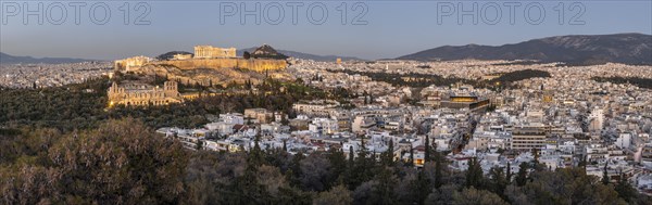 View from Philopappos Hill over the city at sunset