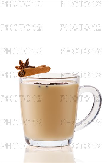 Hot milk winter drink with cinnamon and anise