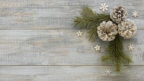 Pine needles wooden background with conifer cones