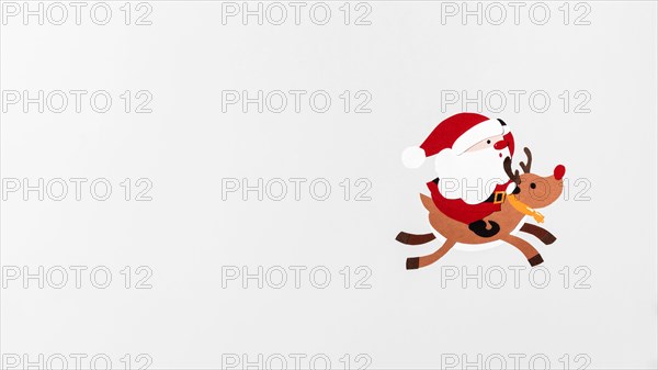 Santa riding reindeer rudolph copy space. Resolution and high quality beautiful photo