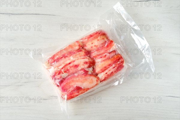 Overhead view of vacuum packed king crab meat