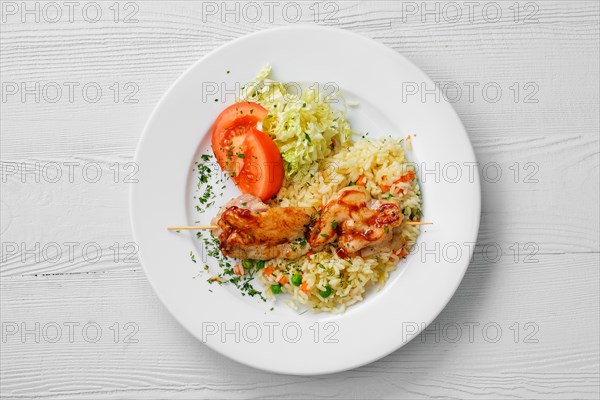 Top view of plate with chicken shashlik