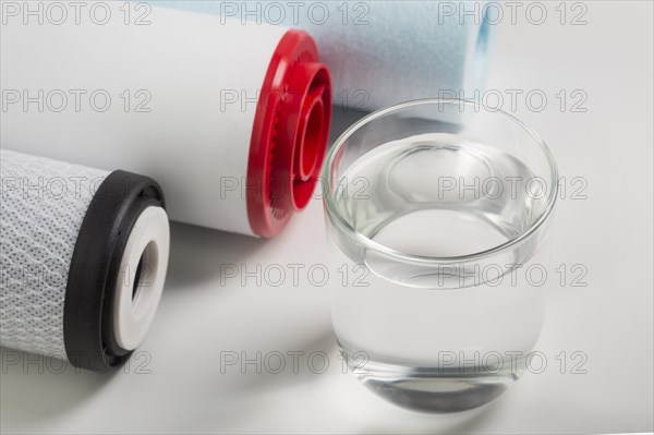 Water filters and glass of water white background. Resolution and high quality beautiful photo