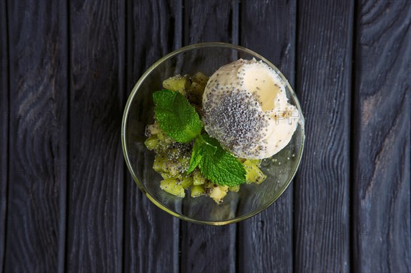 Top view of apple ice cream decorated with kiwi