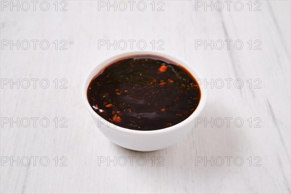 Small bowl with spicy teriyaki sauce