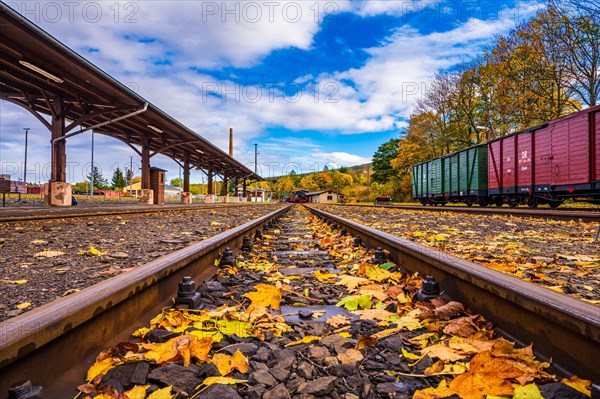 Tracks at Cranzahl railway station with old freight wagons of the Deutsche Reichsbahn