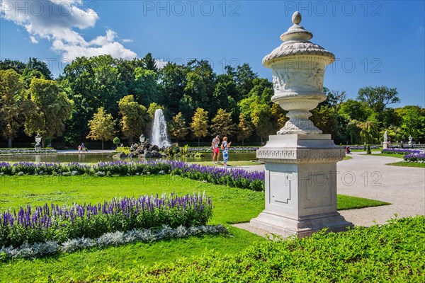 Baroque garden parterre with sculptures in the palace park of Nymphenburg Palace