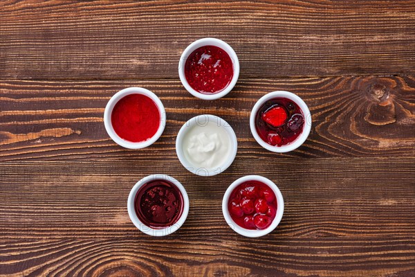 Overhead view of assortment of fruit puree. Jam