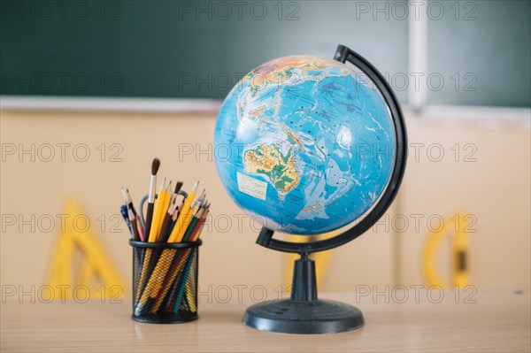 Globe writing tools school table