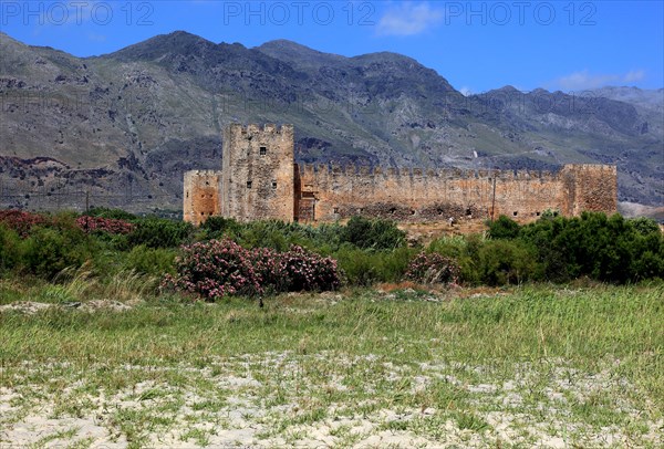 View of the fortress of Frangokastello on the southern coast of the Mediterranean island and the Kryoneritis mountains in the background