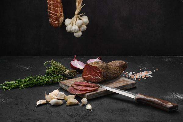 Beef jerky on wooden cutting board