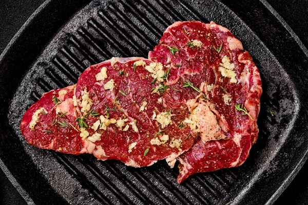 Preparation of ribeye steak in cast iron skillet