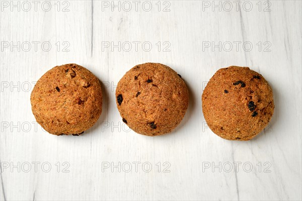 Homemade buns for burger made from rye grain on kitchen table