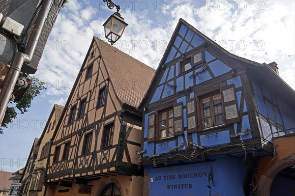 Colourful half-timbered houses in the historic old town of Riquewihr