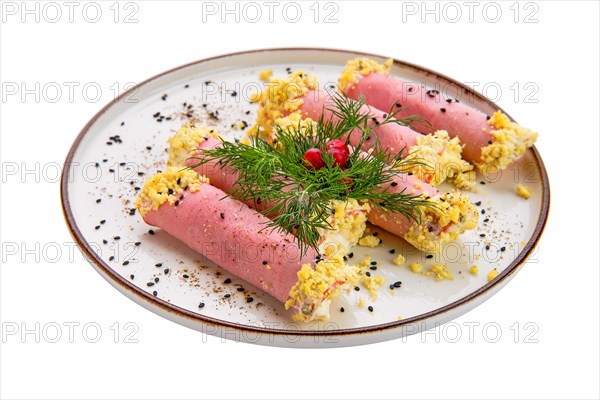 Delicious rolls made of ham stuffed with cheese