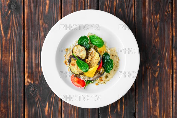 Top view of roasted aubergine with bell pepper