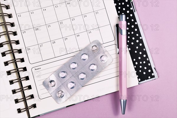 Concept for birth control or other medication with monthly calendar
