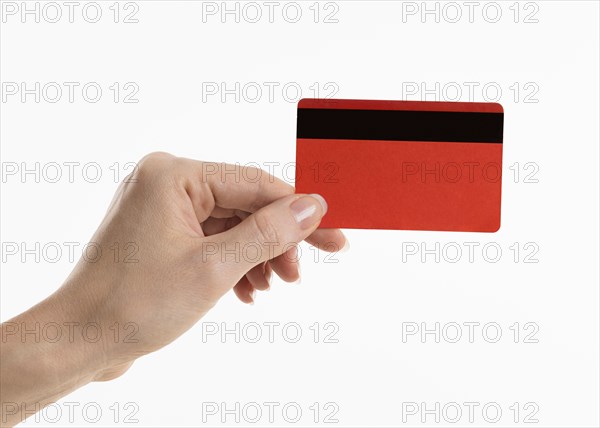 Hand holding credit card