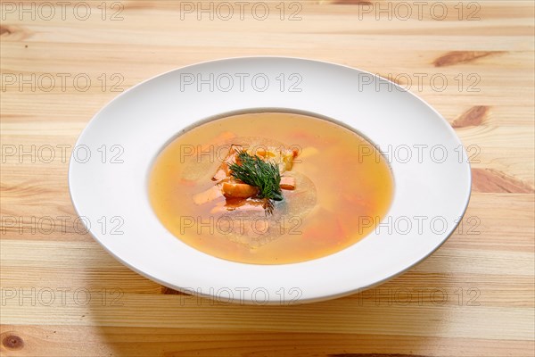 Portion of salmon soup