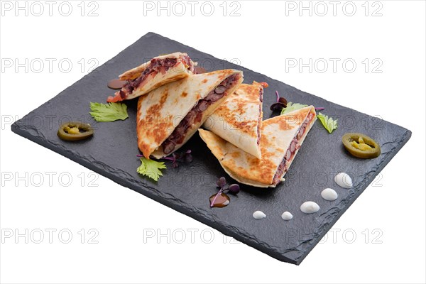 Spicy tortilla with kidney bean and red onion isolated on white background