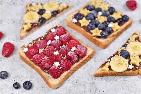 Healthy food with slice of spelt toast bread topped with red raspberry and puffed quinoa grains