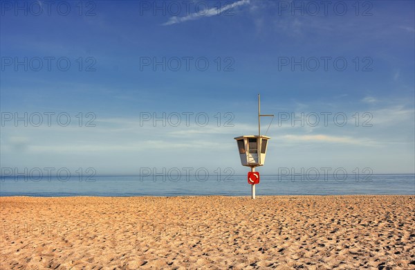 Rescue tower on the empty beach of the seaside resort of Dahme