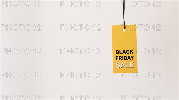 Hanging yellow black friday sale label copy space