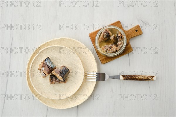 Top view of canned mackerel on a plate