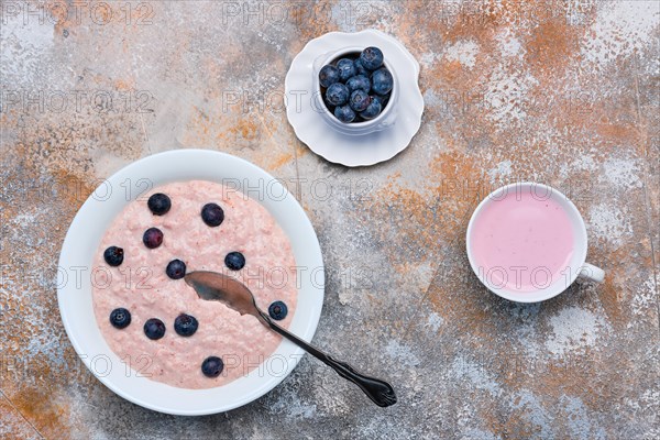 Top view of oatmeal with homemade blueberry yogurt