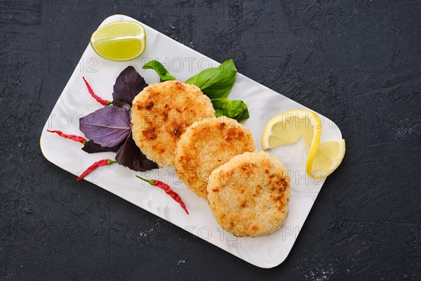 Top view of potato pancakes stuffed with chopped trout