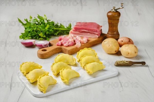 Frozen dumplings with bacon and potato