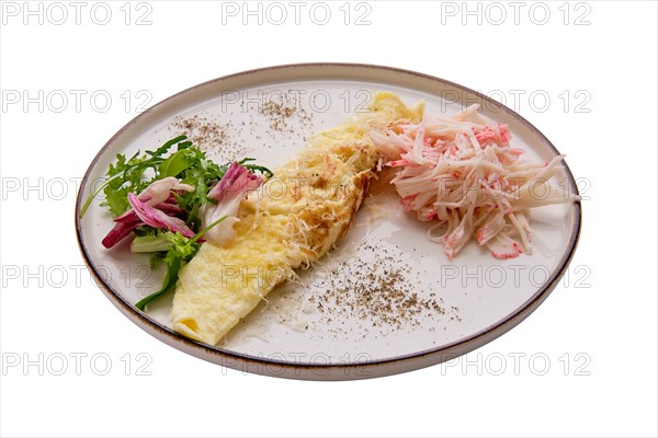 Omelette with crab meat and salad