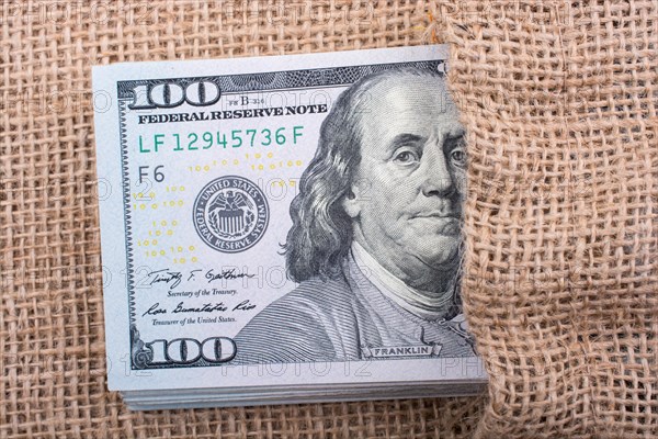 Close up of Benjamin Franklin face on 100 US dollar bill