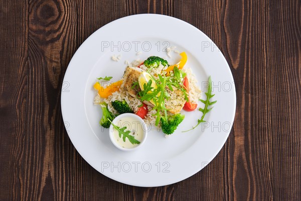 Top view of fried zander with rice