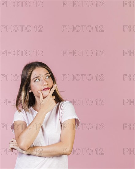 Medium shot girl thinking with copy space