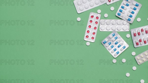 Top view pills frame green background. Resolution and high quality beautiful photo