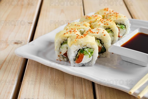 Portion of rolls with salmon