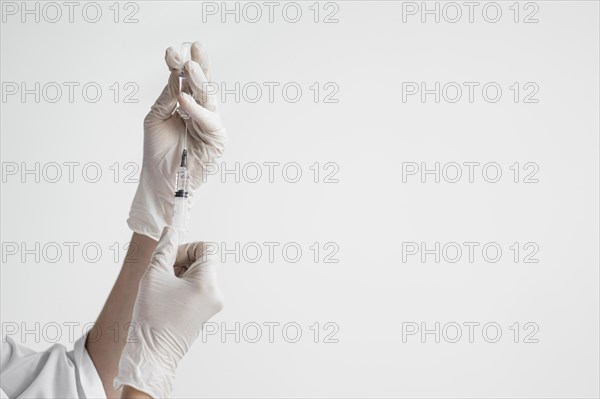 Doctor preparing medical vaccine