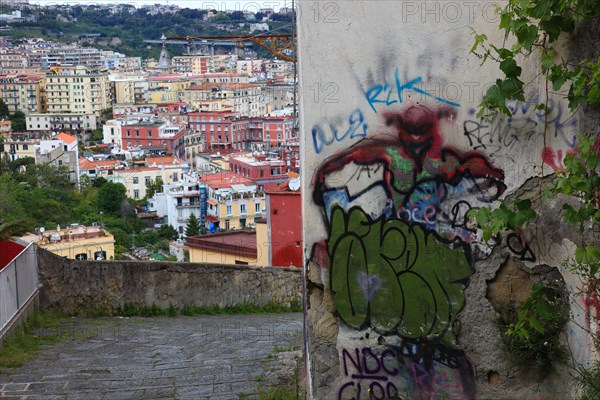 Grafitti and graffiti in the old town of Naples