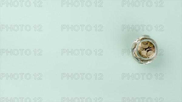 Flat lay jar with coins