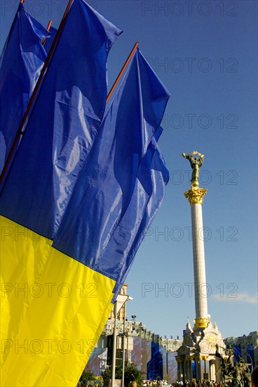 Independence square of capital city Kiev and Ukrainan flag