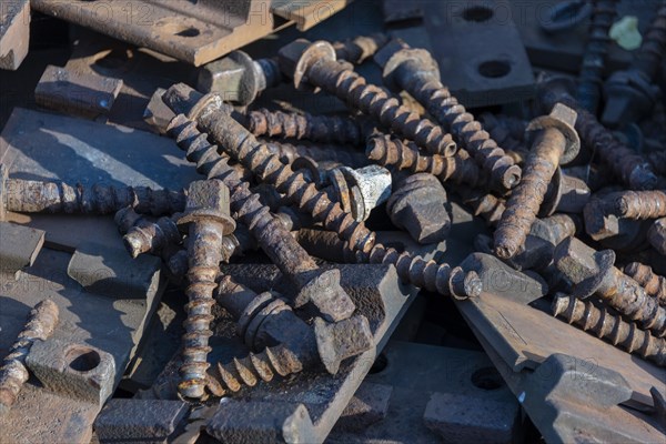 Rusty screws for fastening railway tracks