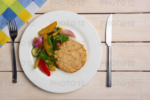 Fish cutlet with grilled potato