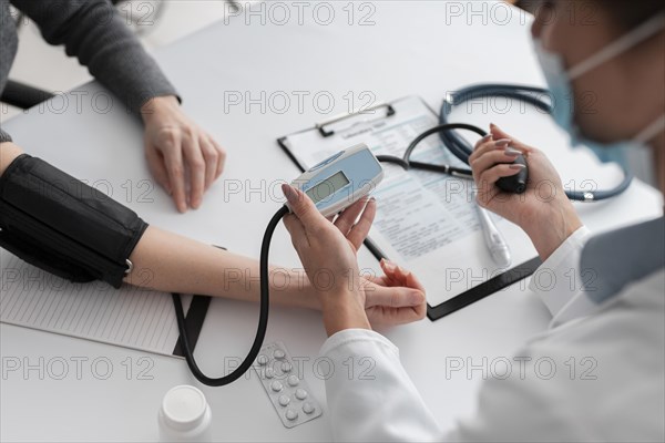 Doctor checking medical condition patient