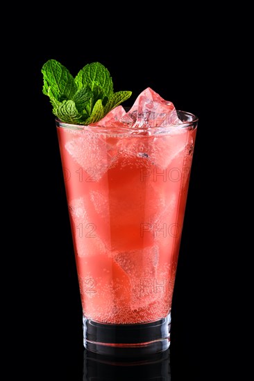 Cold fizz cocktail with strawberry isolated on black background